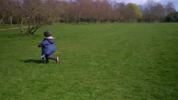 Happy Family Of Children Having Fun In Spring Park