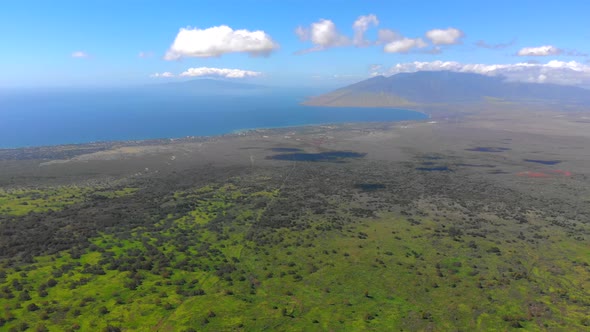 Beautiful 4k drone Maui upcountry near Keokea looking towards Maalaea Bay. February sky.