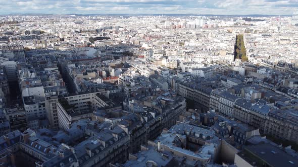 Drone View of the Streets of Paris in the Contrast of Sunlight