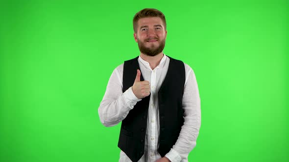 Man Showing Thumbs Up, Gesture Like. Green Screen