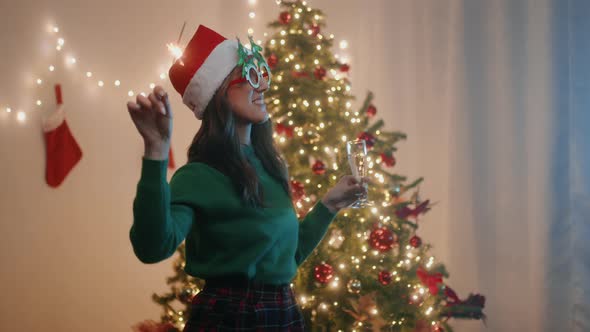 Girl dances on Christmas and New Year