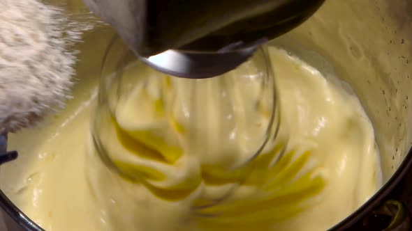 Whisking Egg Yolks and Sugar in a Bowl