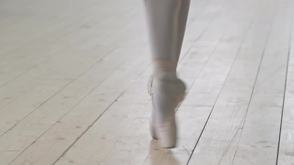 Ballerinas Legs Dancing On Wooden Floor