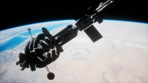 3D Illustration of a Spaceship in Orbit Around Planet Earth alt