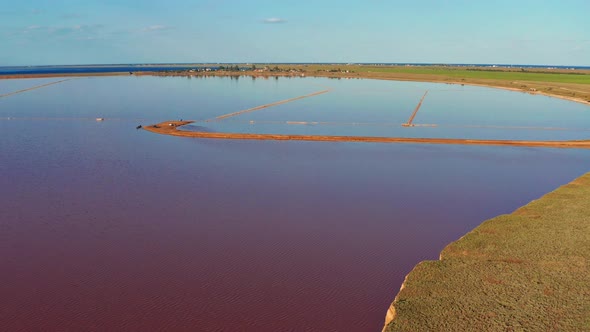 Beautiful top view of the salty, pink lake. Beautiful pink sunset.