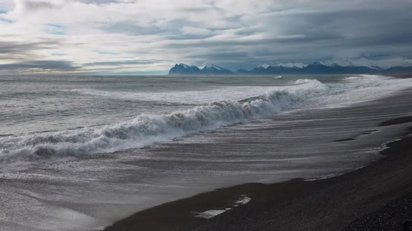 Waves Crashing Onto Black Sand Beach