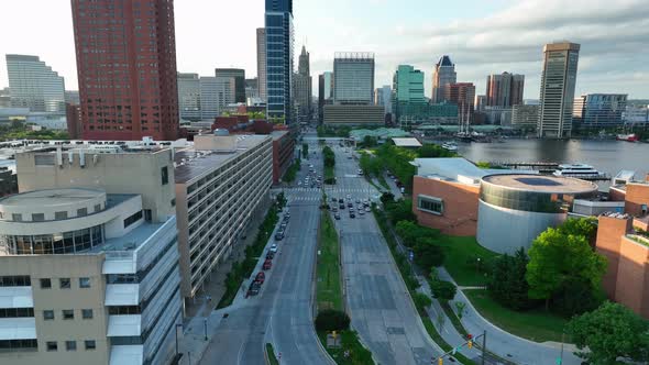 Baltimore Maryland skyline at Inner Harbor. Aerial view above street.