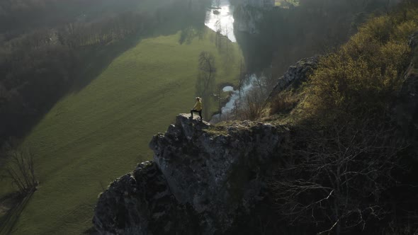 Aerial view of a woman on the rocks, Dinant, Namur, Belgium.