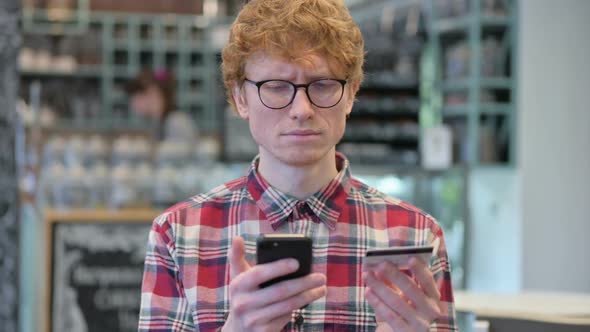 Online Shopping Failure on Smartphone By Redhead Man