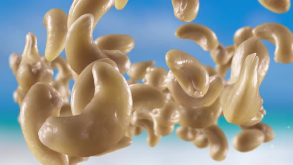 Flying of Cashews in Sky Background