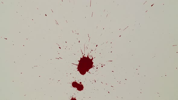 Red Blood Drips on the White Paper