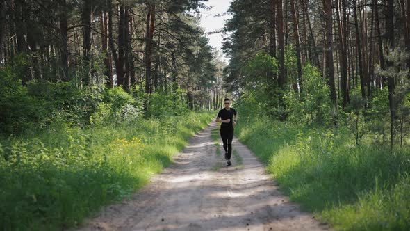 Strong Man Running at Forest