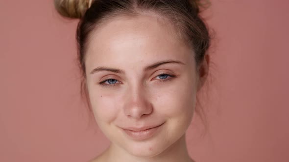 Close up portrait of smiling caucasian teenage woman. Shot with RED helium camera in 8K.