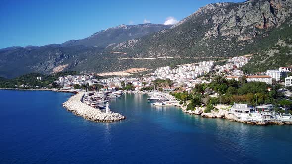 The top view from the drone of Kas resorts, bay, yahts, city in Mugla in Turkey