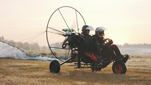 Paramotorgliding. Tandem Paraglider Rising in the Air