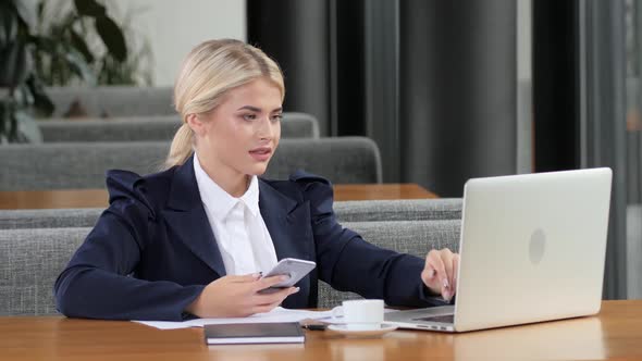 Girl Financier Calculates Profit on Accounts