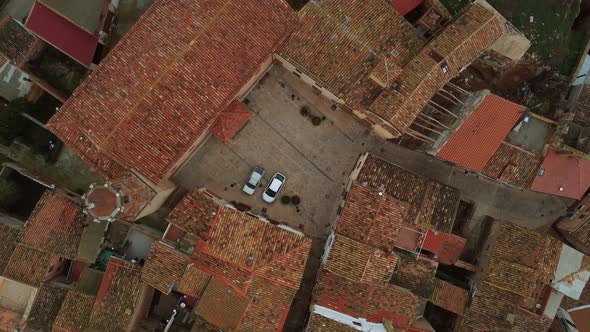 Overhead drone shot of the main square in a typical village in Spain