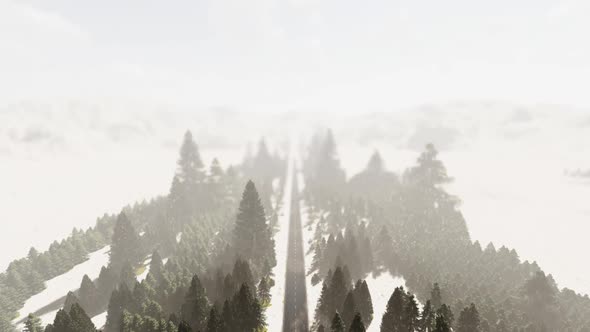 Flight Over Mountain Road In Snowfall 1