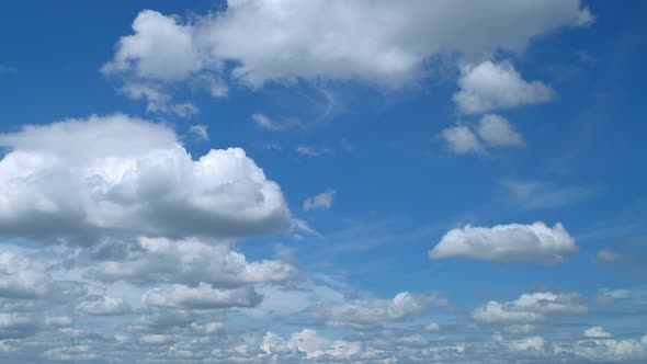 220607_Fluffy cloud time lapse on a cloudy day 4k footage.