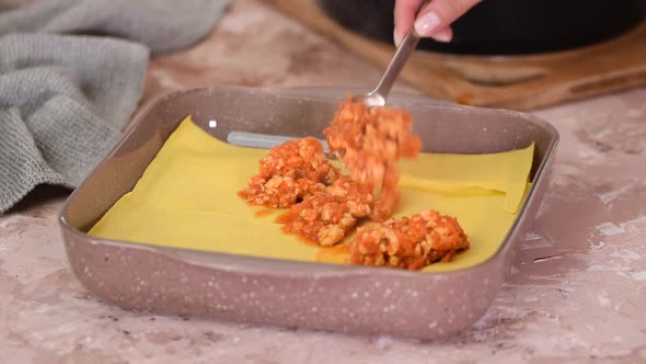 Woman Cooking Homemade Classic Lasagna Bolognese