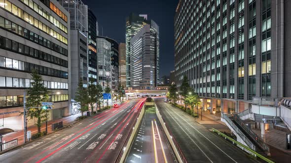 Skyscrapers And Traffic At Night In The Center Of Shopping District Of Ginza In Minato City, Tokyo,