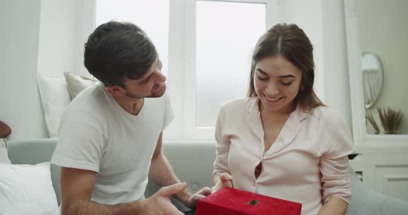 Beautiful Young Couple Home Atmosphere, Sitting