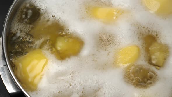 Boiling Potatos in Water in Saucepan