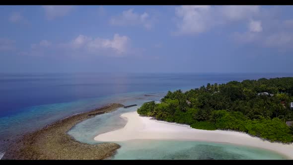 Aerial drone view landscape of perfect seashore beach adventure by aqua blue ocean and white sandy b