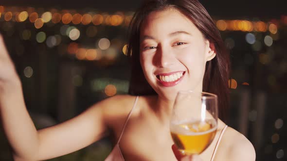 Young asian woman with sparklers is dancing and celebrating a new year. Fireworks,