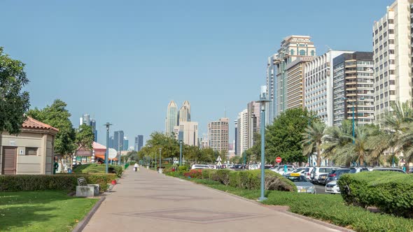Corniche Boulevard Beach Park Along the Coastline in Abu Dhabi Timelapse with Skyscrapers on