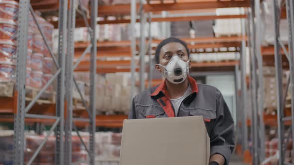 Working Woman With Box At Warehouse