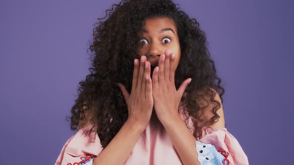 Darkskinned Girl in Pink Blouse