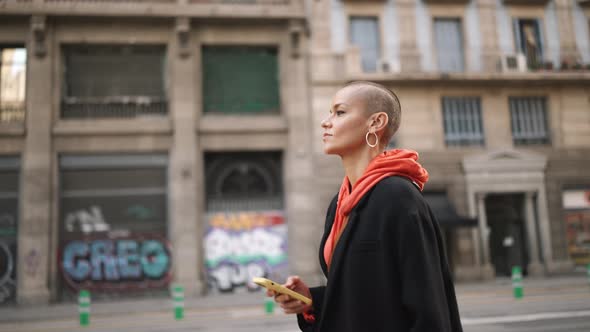 Confident bald woman walking