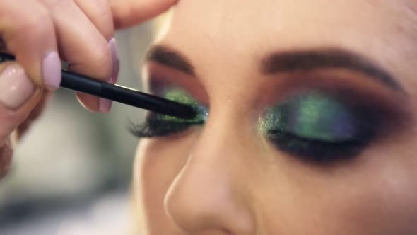 Extremely Close Applying Shine Bright Green Shadows on Eye Corner