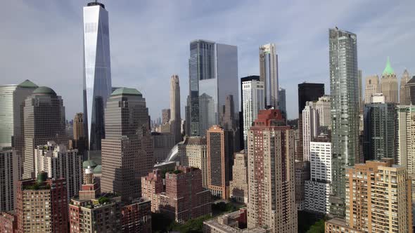 Aerial view of tall buildings in the lower Manhattan skyline, in sunny New York, USA