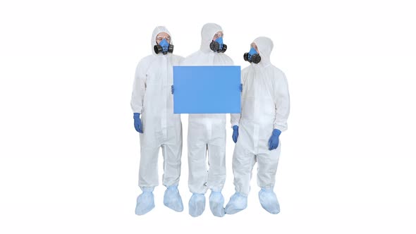 Three Doctors in Protective Suits Holding Blank Board on White Background.