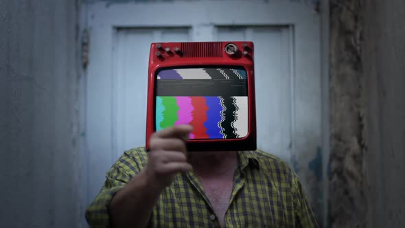 Elderly Man with an Old TV Instead of Head, showing Color Bars on Screen.