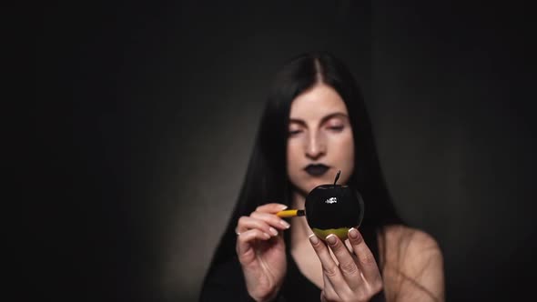 Girl Dyes an Apple