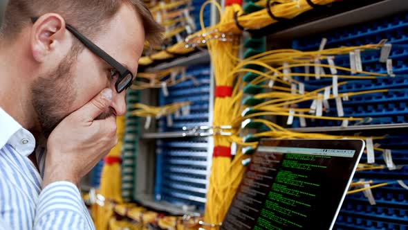 Engineer Working in Data Room