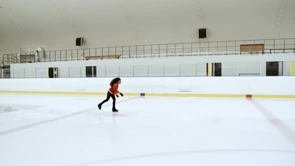 Girl Skating on One Leg