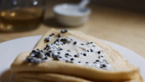 Lump Fish Black Roe Blinis with Taramasalata