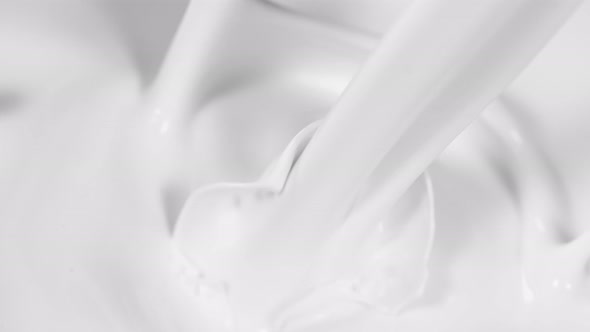 Super Slow Motion Shot of Pouring Fresh Milk at 1000Fps