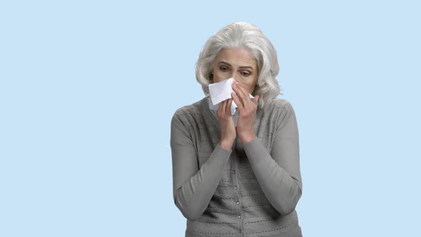 Mature Woman Sneezing