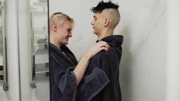 Cute Couple of Men with Towel Drying Each Other After Shower