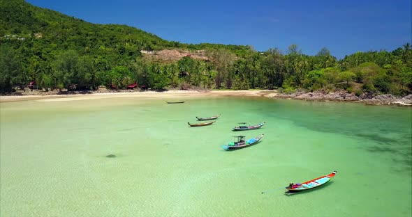 Aerial Shot of Blue Sea and longTail Boats Chaloklum Koh Phangan Thailand