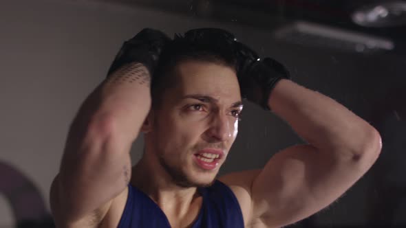 Close up of a trainer's sweaty face