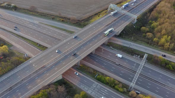 Vehicles Driving on a Freeway at Sunset Using The Junction and Bridges