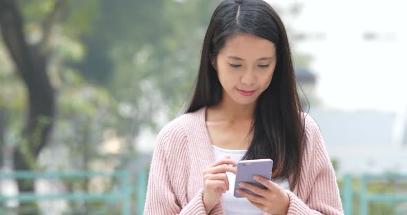 Young woman using mobile phone