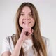 bring your index finger to your lips. slow motion - VideoHive Item for Sale