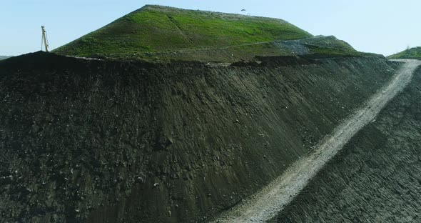 Drone flight over the municipal waste hill.